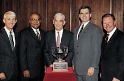 Miller Brewing Co. (Milwaukee, WI) has named Owens-Illinois, Inc. (Toledo, OH) its Supplier of the Year. Shown from left to righ
