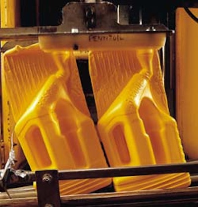 In blow molding, freshly molded Rescue containers are transferred to a trim station where flash is removed and gas is vacuumed o