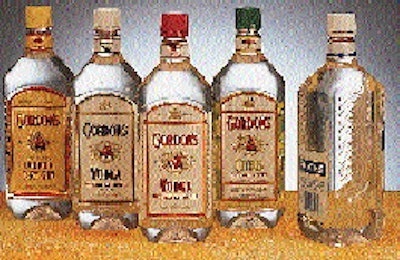 A pallet load of bottles conveys from right to left into the hoist area of the depalletizer (above). This line produces 1.75-L