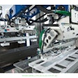 Top loading machine places blisters online.