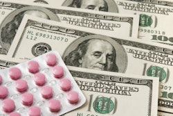 Pills on money background