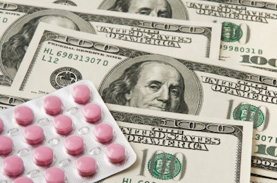 Pills on money background