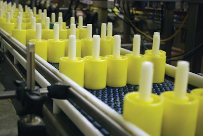 Northstar’s new lip balm line relies on pucks to keep the slender containers upright during the filling and capping process.