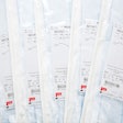 This photo shows five packs of Cook Medical products.