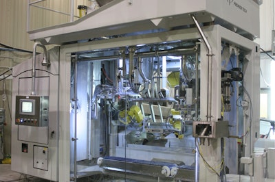 Robotic BFW machine combines hygienic spout, FANUC robot, and a bottom-up filling system.