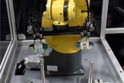 Loading system integrated with rotary-type blister sealer to create automatic blister loading and sealing.