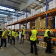 Cool Chain attendees view the ambient storage area in Luxair Cargo’s new Pharma & Healthcare Hub. The facility can accommodate 1,270 Euro pallets of 15°C to 25°C product.