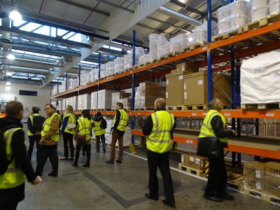 Cool Chain attendees view the ambient storage area in Luxair Cargo’s new Pharma & Healthcare Hub. The facility can accommodate 1,270 Euro pallets of 15°C to 25°C product.