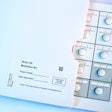 BLISTER PACK. This compliance-prompting pack for a clinical trials application includes room for patient initials and date dispensed.