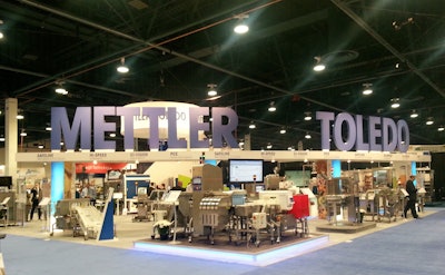 This is a photo of a Mettler Toledo booth at a previous trade show. At PackExpo 2014/PharmaExpo 2014, the company will show a series of inspection equipment that helps pharmaceutical companies improve product quality and manufacturing efficiency.
