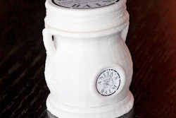 Anita’s Balm founder brings package manufacturing in-house, creating a custom twist-up container resembling a mini amphora jar, made from compostable PLA resin.