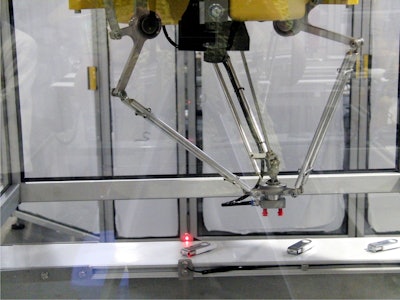 ESS TaskMate with Fanuc M-1iA Robot provides automatic blister loading for Starview Packaging Machinery.
