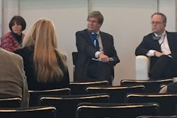 Panelists talk during one of the panel educational sessions at Pharmapack Europe.