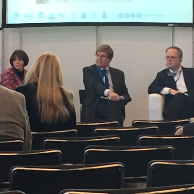 Panelists talk during one of the panel educational sessions at Pharmapack Europe.