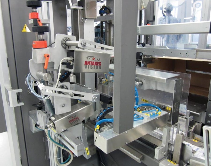 INBOUND CARTONS. As cartons visible in the lower right corner are conveyed into a case packer, a camera reads all 100 unique car