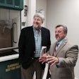 Carlos Daniel Stagnaro (right), Director, Global Business Development for kp’s Pharmaceutical Films Division, proudly shows off his brain child, a new innovation center for pharma packaging, to Healthcare Packaging Publisher Jim Chrzan.