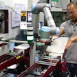 A Universal Robot operates within a mini work cell at Tegra Medical.