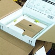 Top view of opened Credo Cube showing inner product box surrounded by interlocking TIC panels.