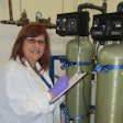 Ivette Larralde-Valdes conducts auditing of a microbiology water sample at the Purified Water System Utility area.