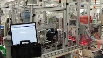 New semi-automated equipment has replaced the manual assembly of the label and foil seal operations, increasing quality and volume.