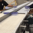 System includes a center rail for a hand-packing line; increases productivity and is well-suited for contract packaging applications.