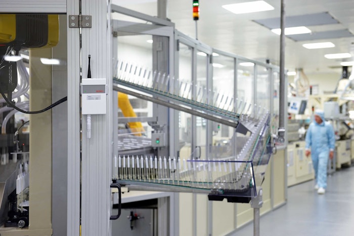 This photo shows a manufacturing cleanroom where 'warm times' can affect product quality.