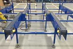 Multi-strand auto pick conveyor is designed to convey corrugated cases containing stacked heavy metal products.