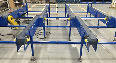 Multi-strand auto pick conveyor is designed to convey corrugated cases containing stacked heavy metal products.