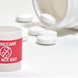 Red labels help differentiate desiccant from the drug product; only FDA- and EU-compliant materials are used.