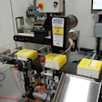 Serialized cartons are shown here as they output from the Nutec carton conveyor.