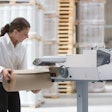 Paper-based protective packaging equipment uses 100% recycled-content paper to create cushioning and block/brace solutions to help secure products in transit.