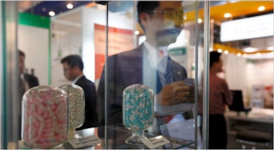 Chinese drug makers at Milan trade show without certification. Photo: NYT