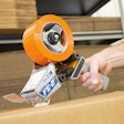 New folded-edge hand dispenser for manual carton sealing applications creates a reliable, secure seal.