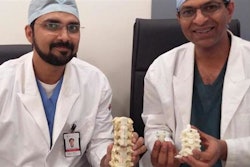Dr. Kumar and Dr. Naik with 3D printed titanium vertebrae implant. / Photo: 3Ders