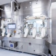 Steriline’s RVFCM50 Robotic Vial Filling and Capping Machine features glove ports on either side of the machine to allow for complete access to the line.