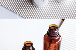 Colorful pad printing on top of closures allows improvements in brand identity; permits putting a message on top of a bottle.