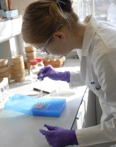 Emilia Hevelke prepares samples for testing in Smithers’ analytical chemistry laboratory in Leatherhead, U.K.