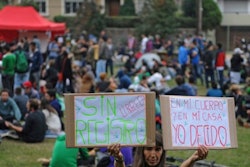 A protester against the marijuana registry. / Image: Getty Images