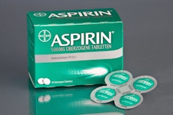 Shown here is Bayer’s Shamrock aspirin pack next to its outer folding carton.
