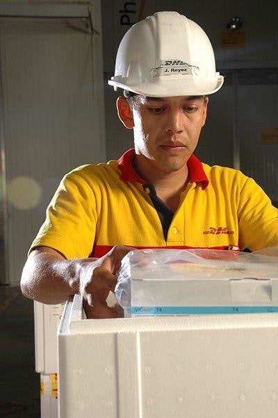 An operator packs a temperature-controlled shipment.