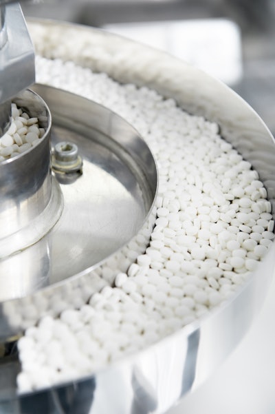 Shown here are tablets moving along a production line.