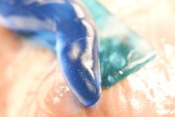 A new, flexible adhesive material inspired by the glue secreted by slugs adheres to biological tissues (even when wet) without causing toxicity, and can be formed into either sheets (teal blue) or custom shapes (dark blue). Credit: Wyss Institute at Harvard University