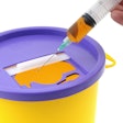 Agency believes final order will decrease regulatory burden on manufacturers as they will no longer be required to submit a premarket approval application (PMA), but can instead submit a less-burdensome premarket notification (510(k)) before marketing this type of device. Shown here is a sharps collection container, not a needle destruction device.