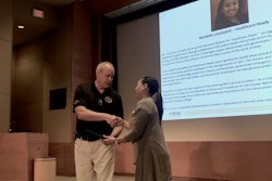 Nicolette Louissaint, Executive Director of Healthcare Ready, receives an award from PCSC.