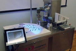 The Smart Table is backlit to take advantage of a smart vision system that takes chromatic shift into account for precision robotic picking.