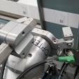 Inspecting data on printed labels for application to bottles.