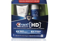 Crest's eye-catching green paperboard tray is recyclable and holds tubes in place.