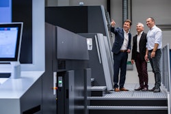 Rondo AG is conducting what is reported as the world's first pharmaceutical packaging beta test with the Heidelberg Primefire 106, shown here with Joachim Hoeltz (left), CEO Rondo AG and Giovanni De Luca (right), Director Operations Switzerland Rondo AG, as well as Philippe Andrey of Heidelberg Switzerland.