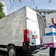 Delivering a shipment to a patient's residence.