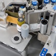 A close-up of Herma's 132M Wrap-around Labeler.